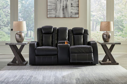 Caveman Den - Power Reclining Loveseat with Console/ Adj Hdrst - Midnight
